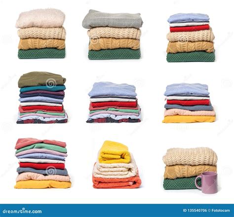 Set Of Stacks Of Folded Clothes On White Background Stock Photo Image