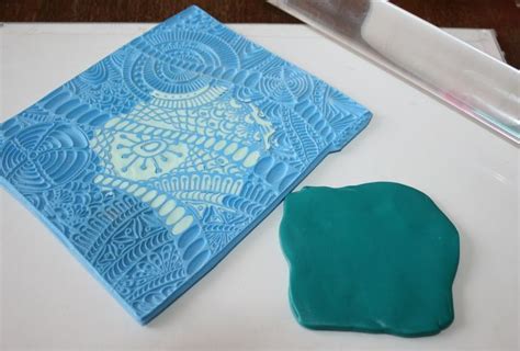 A Blue Cookie Sitting On Top Of A White Cutting Board