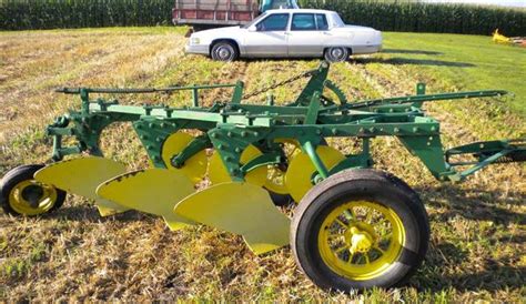 John Deere 3 Bottom Hydraulic Pull Plow For Sale