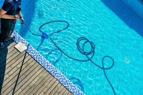 How to Use a Manual Pool Vacuum - Home Guide Corner