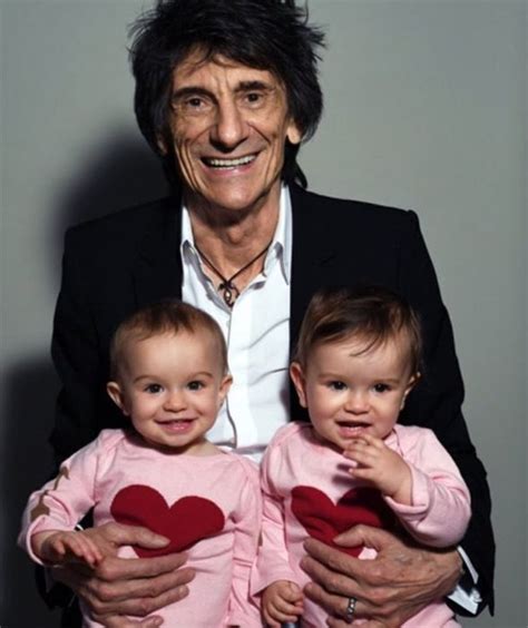 Ronnie Wood Poses With Twin Daughters To Mark 70th Birthday