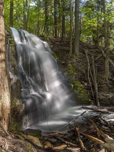 Silverfallet Staircase Waterfall Illuminated By Low Rays Of Sun Stock