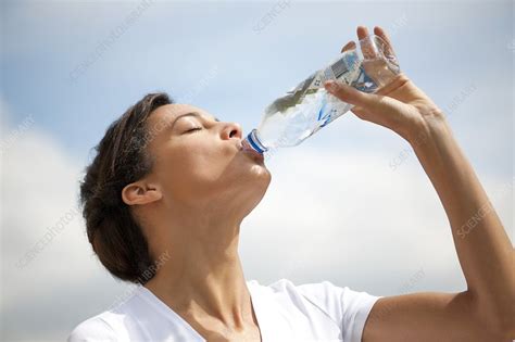 Woman Drinking Bottled Water Stock Image F0040708 Science Photo