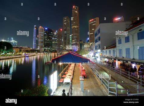 Restaurants At Boat Quay At Night Skyscrapers Of Financial District