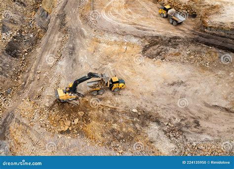 Aerial View Of Excavators Digging Ground Opencast Mining Quarry Stock