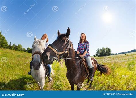 Two Female Horseback Riders Mounted On Horses Stock Image Image Of