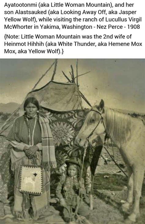 An Old Black And White Photo Shows A Native American Woman Standing