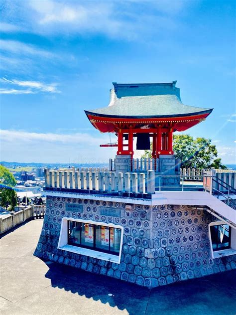 Traditional Japanese Bell Tower With Vibrant Sky Editorial Stock Photo