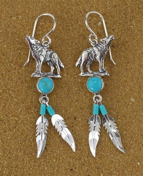 Sterling Silver And Turquoise Wolf Feather Earrings Happy Glastonbury