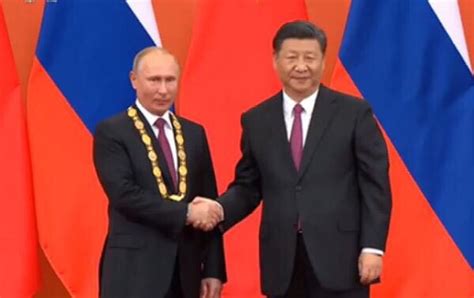 Xi Putin Agree To Promote Greater Development Of China Russia Ties At