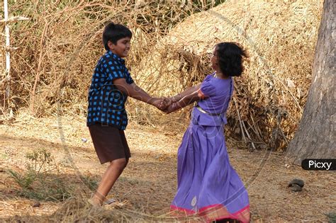 Image Of Indian Brother And Sister Playing In A Rural Village Ld839078 Picxy