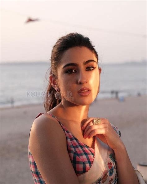 Beautiful Sara Ali Khan In A White Floral Saree With Pink And Blue