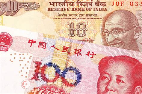 Ten Indian Rupees With One Hundred Chinese Yuan Stock Image Image Of