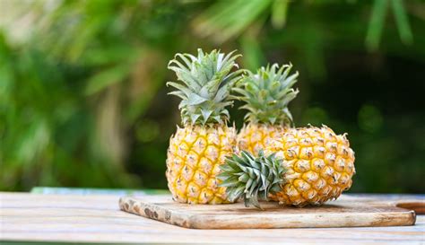 pineapple wooden cutting board for food fruit ripe pineapple on nature ...