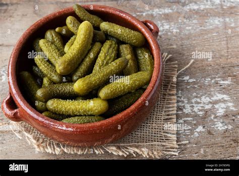 Pickled Gherkins On Rustic Background Stock Photo Alamy