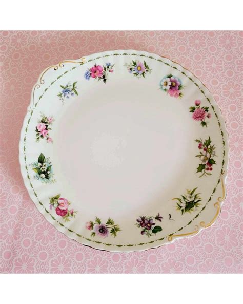 Plat à gateau Flower of the month Royal Albert en porcelaine comme neuf