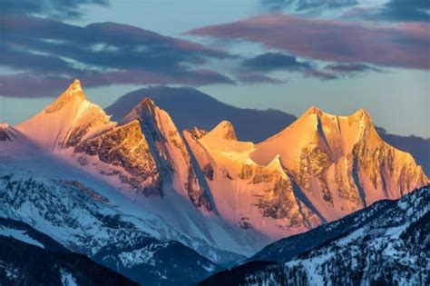 Premium AI Image | Mountain Alpenglow Winter Sunset