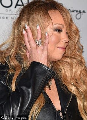 Mariah Carey Flaunts Her Curvy Derriere In Very Saucy Stockings And