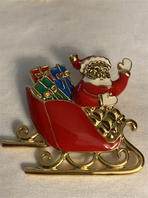 Avon Vintage Santa In Sleigh Gold Tone With Enamel Gem