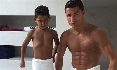 Cristiano Ronaldo Shirtless With His Son Striking A Matching Pose In