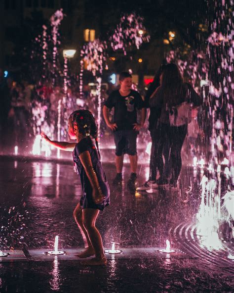 Kids Playing on the Water Fountain · Free Stock Photo