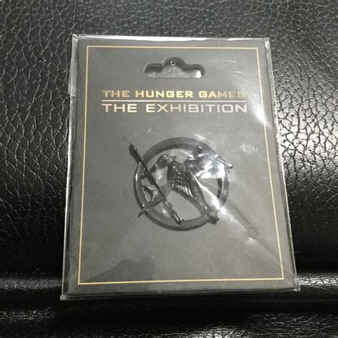 The Hunger Games Mockingjay pin! An exclusive black... - Depop