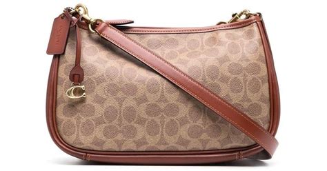 Coach Leather Cary Monogram Crossbody Bag In Brown Pink Lyst