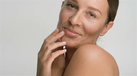 Close Up Beauty Portrait Of Young Woman With Smooth Healthy Skin She Gently Touches Her Face