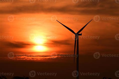 Wind turbines silhouette at sunset 1240446 Stock Photo at Vecteezy