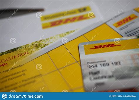 Close Up Of Dhl Deutsche Post Correspondance And Card For Application