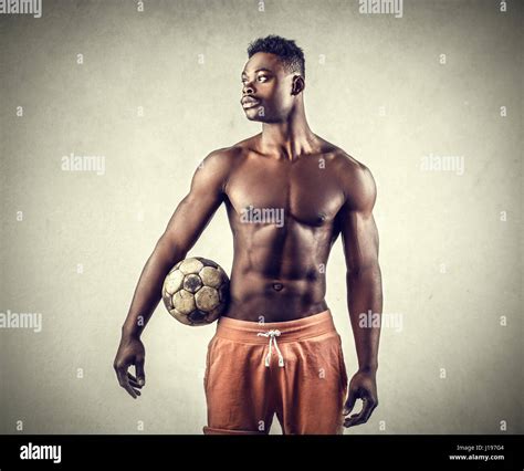 Muscular Man Football Ball Hi Res Stock Photography And Images Alamy