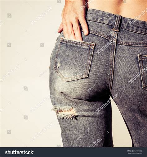 Woman Wearing Denim Shorts With Holes Stock Photo 151950692 Shutterstock