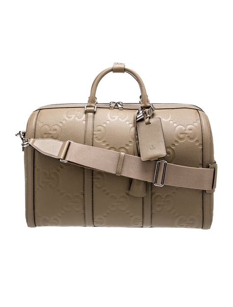 Gucci Gg Embossed Duffle Bag Brown Weekenders Bags Guc