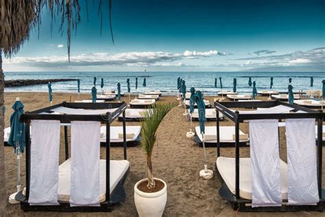 Sunbeds On The Beach In Playa Los Americas On Tenerife Spain Stock