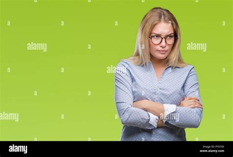 Young Caucasian Business Woman Wearing Glasses Over Isolated Background Skeptic And Nervous