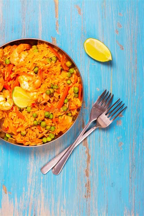 Traditional Spanish Paella Dish With Seafood Peas Rice And Chicken Stock Image Image Of