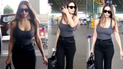 Malaika Arora Flaunts Her Hard Earned Body In Tank Top With A Plunging