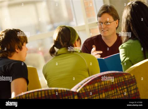 man teaches students stock photo alamy