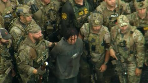 Pennsylvania Police Take Group Photo With Captured Fugitive Danelo