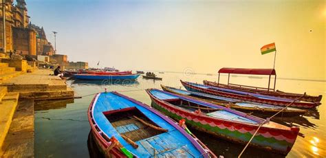 Scenic Boats Close To The Banks Of Ganga River In The Early Sunrise