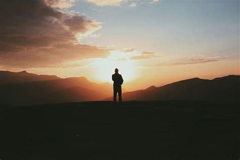 HD Wallpaper Silhouette Photo Of Man Standing On Mountain During