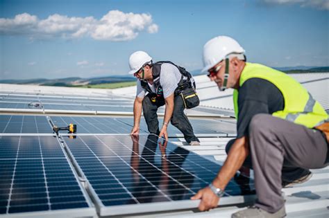 Working On The Installation Of A Photovoltaic Solar System Stock Photo ...