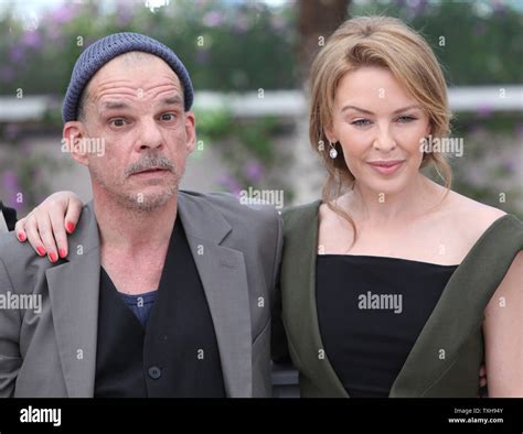 Denis Lavant L And Kylie Minogue Arrive At A Photocall For The Film