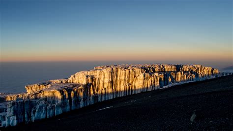 The Last Remaining Glaciers Of Kilimanjaro At Sunrise Sadly Melting