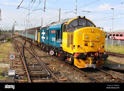 Class 37 Diesel Electric Locomotive In British Rail Large Logo Livery Approaching Carnforth