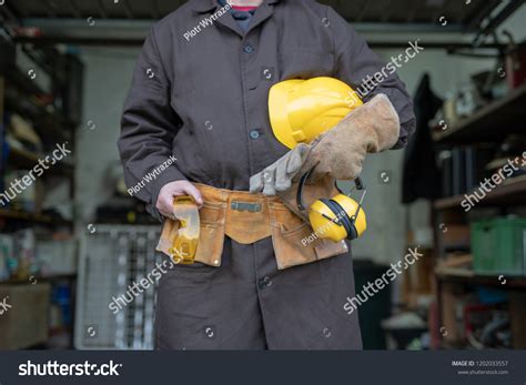 Mechanic Locksmith Workshop Employee While Working Stock Photo