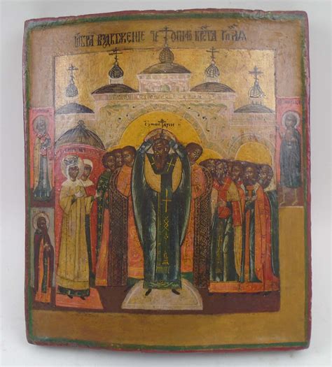 18TH CENTURY RUSSIAN ICON, portraying saintly figure and petitioners, painted on wooden panel ...