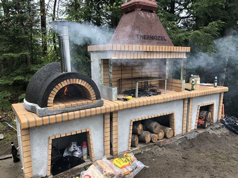 Firebrick outdoor kitchen with large pizza oven - ROTISSERIE BBQS ...