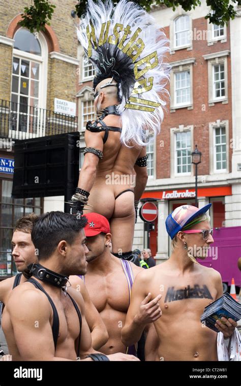 Semi Naked Man With Mahican And Stilts At The London World Pride To