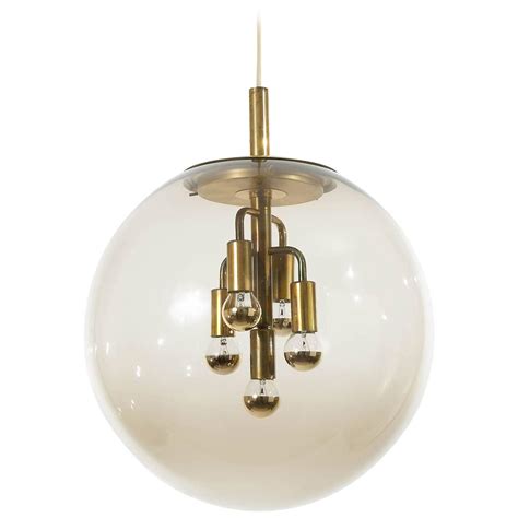 Large Limburg Pendant Light Brass And Amber Glass Globe 1960s At 1stdibs